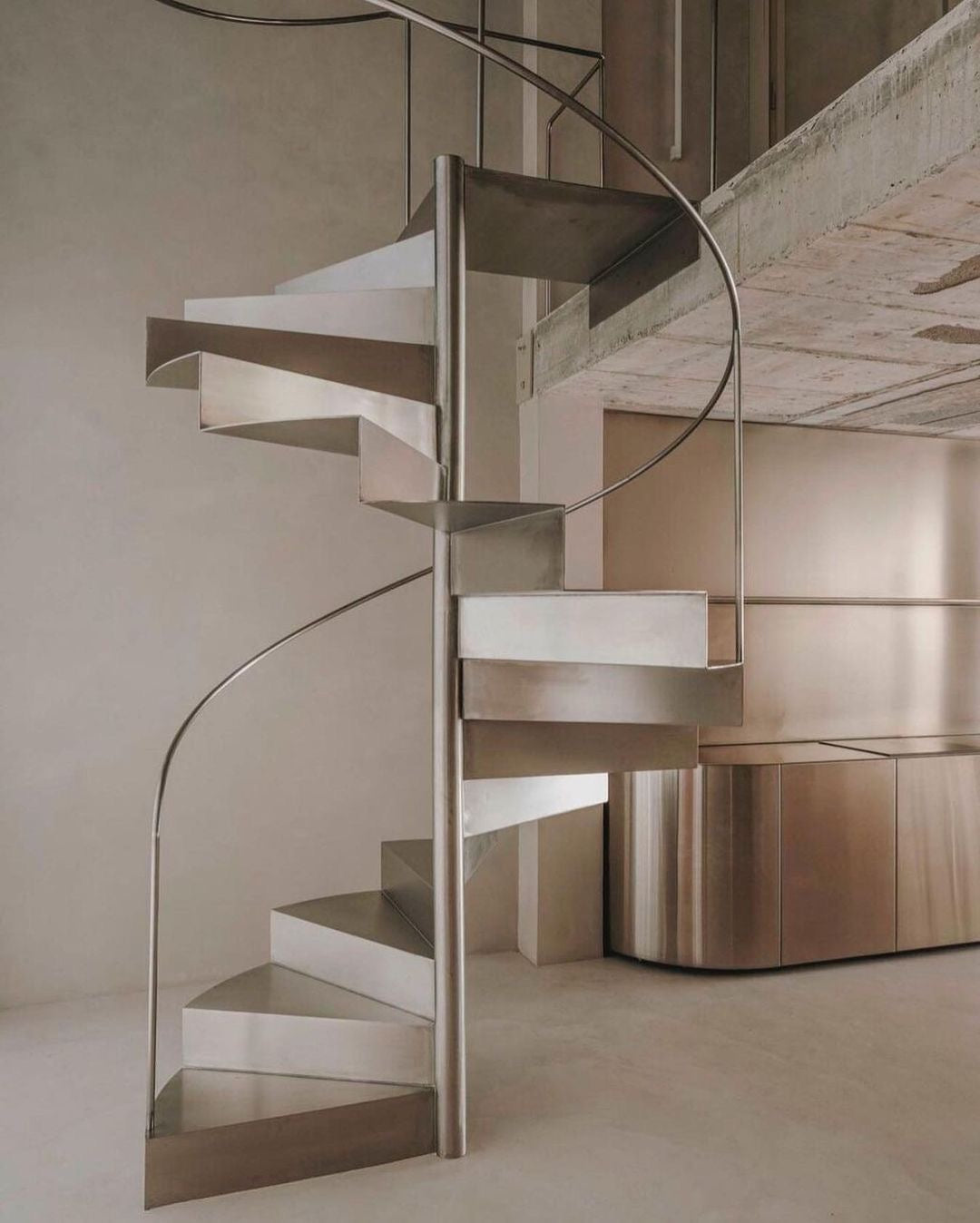 Metallic stairs and kitchen design by Isern Serra for Andrés Reisinger. Image: Salva Lopez | SelectedBy